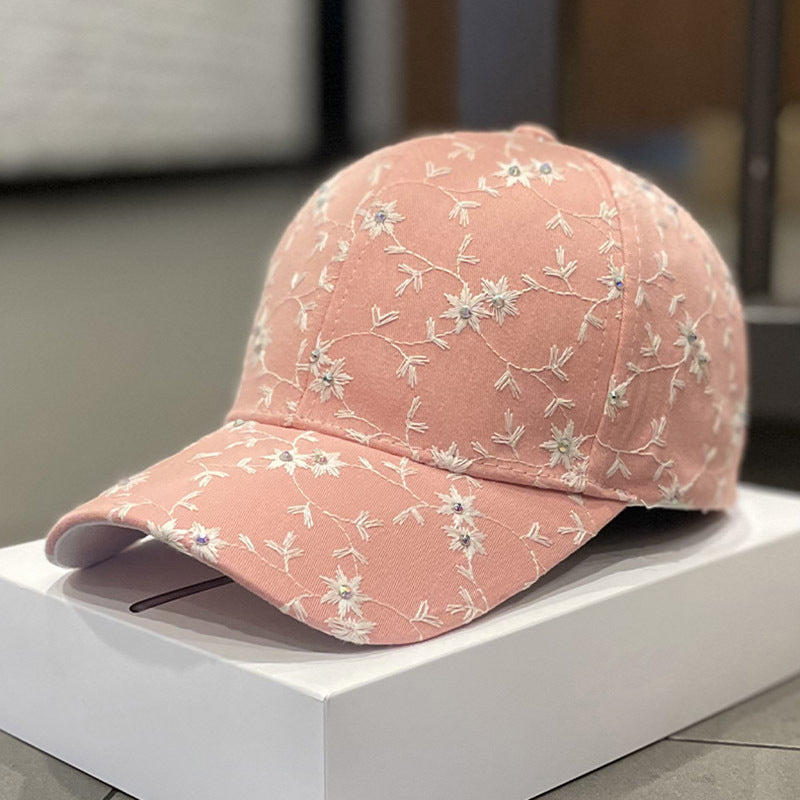 Kvinne pyntet blomster caps Skanto