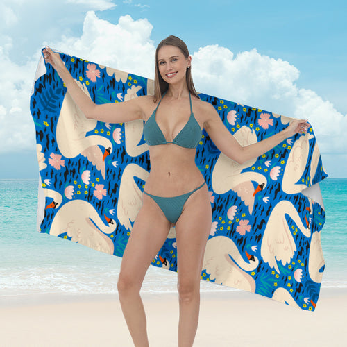 Strandhåndkle med kreative surf-motiver Skanto