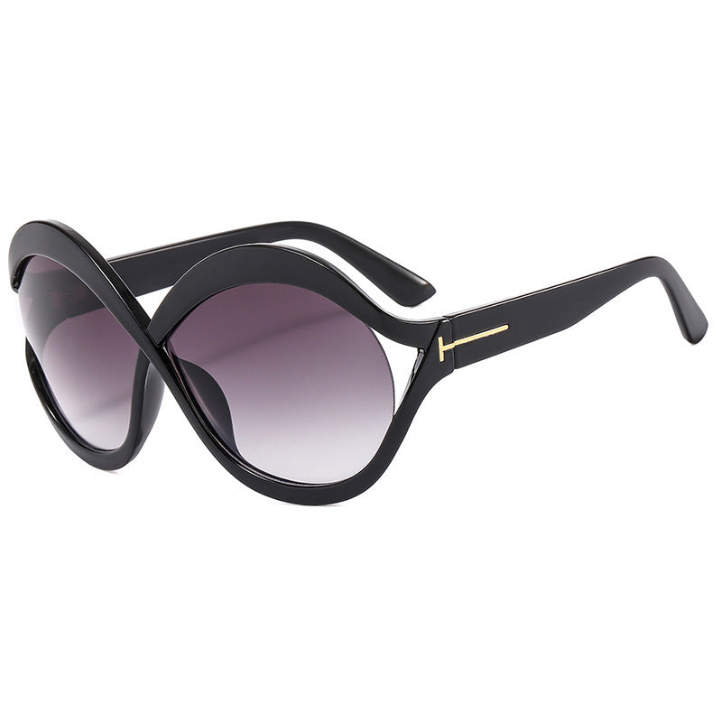 Dame ekstravagant formet solbrille Skanto