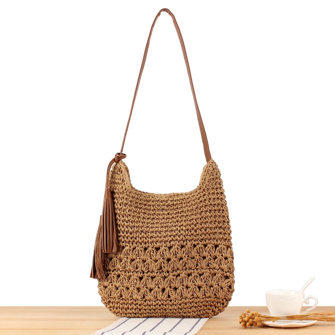 Shoulder bag made of hand-knotted natural materials with fringe-decorated shoulder strap Skanto