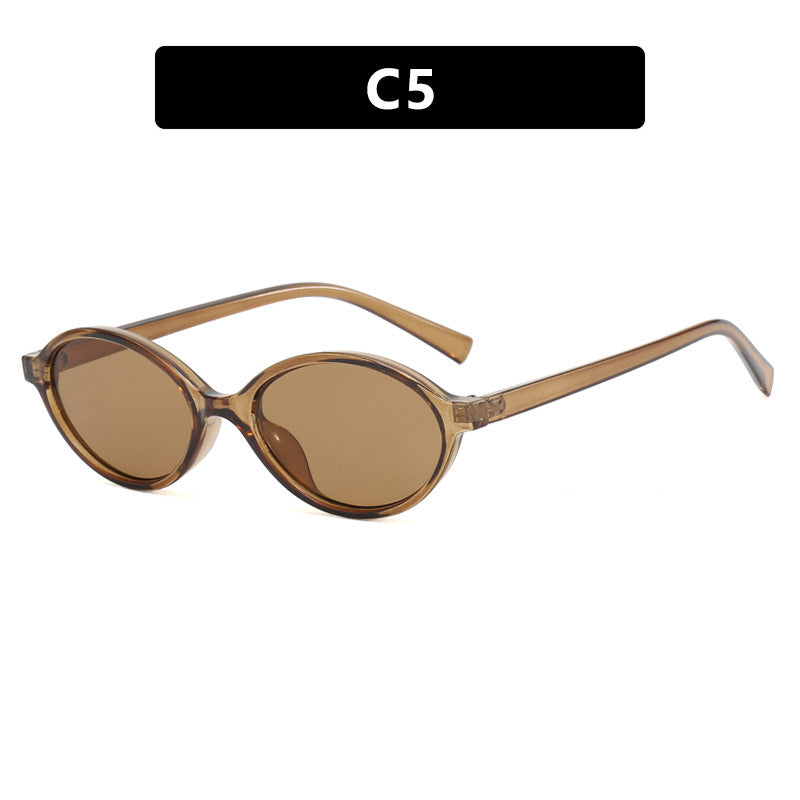 Dame moteriktig solbrille med unikt ovalt design Skanto