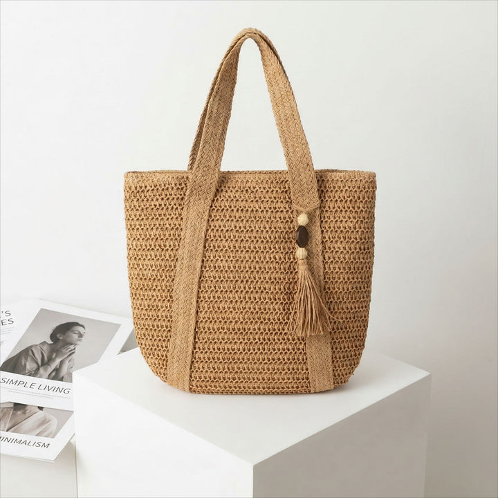 Elegant crossover bag made of braided straw Skanto