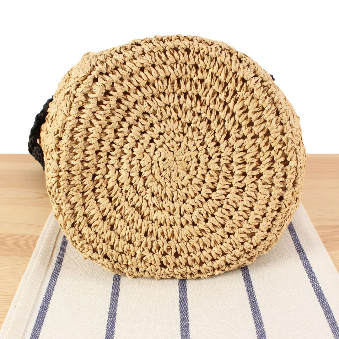 Handbag made of hand-knotted natural material with floral application Skanto