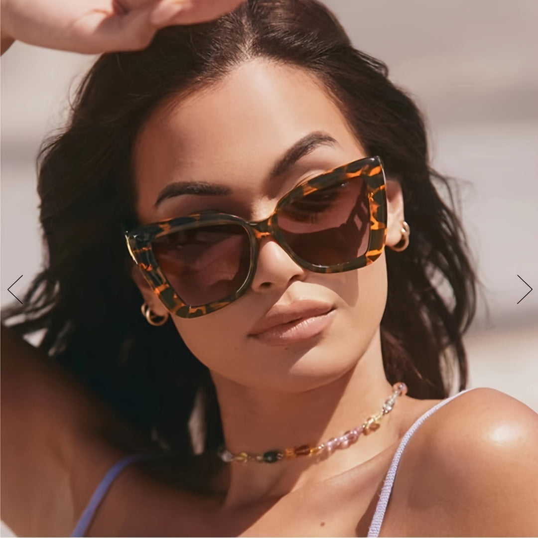 Dame moderne Cat-Eye solbriller med klar ramme og UV-beskyttelse Skanto