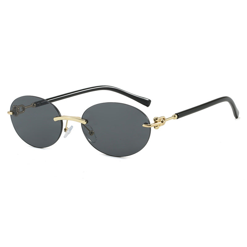 Women's oval sunglasses with luxurious metal frame and mirrored lenses Skanto