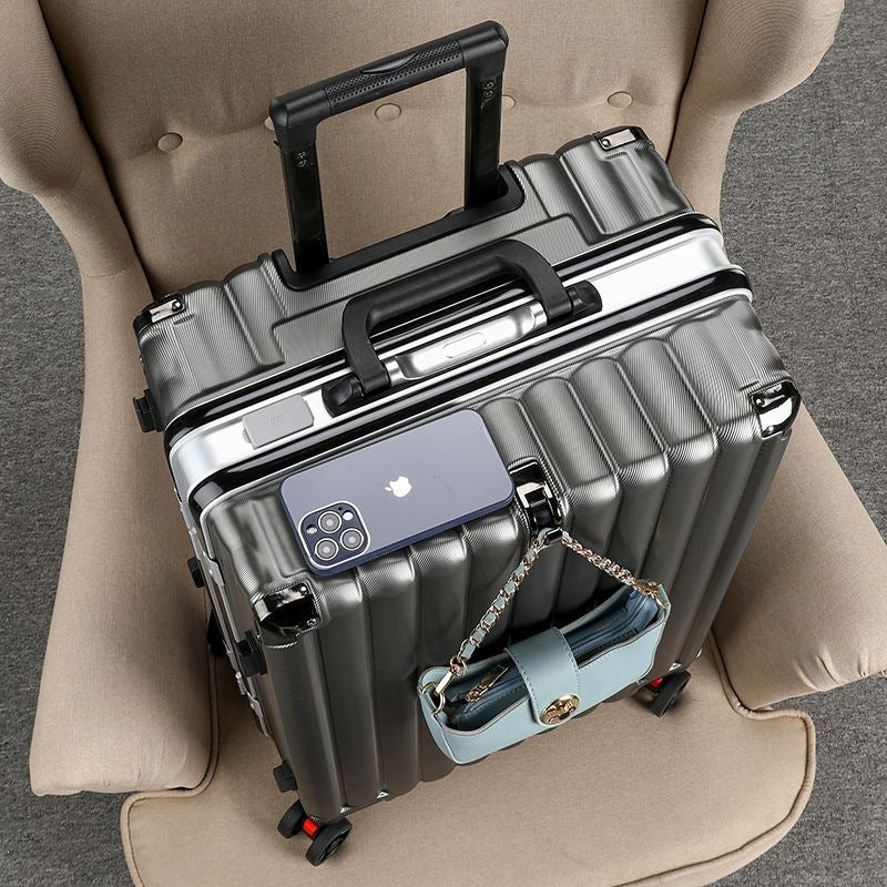 Hardplasttrolley med integrert USB-ladeport og multifunksjonell lagring Skanto