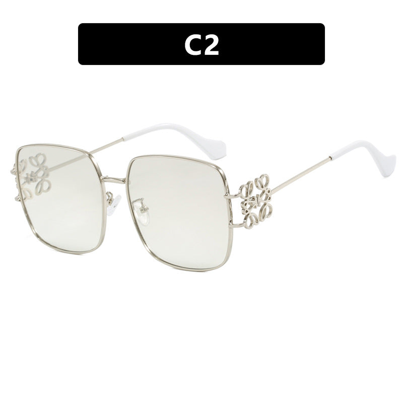 Women's square sunglasses with filigree design and luxurious metal frame Skanto