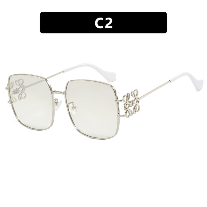 Women's square sunglasses with filigree design and luxurious metal frame Skanto