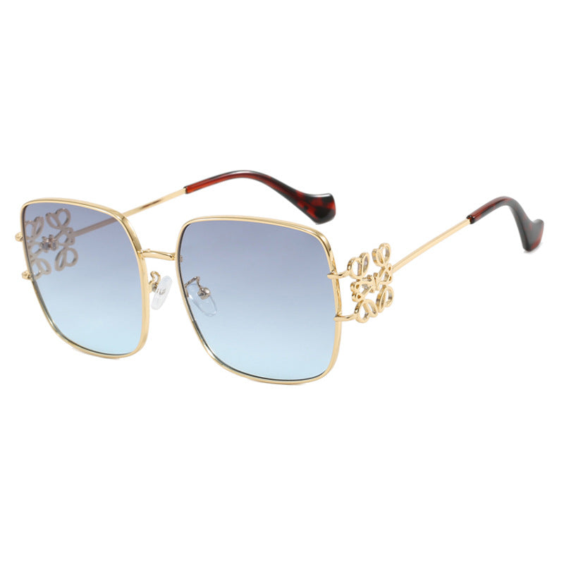 Women's square sunglasses with filigree design and luxurious metal frame Skanto