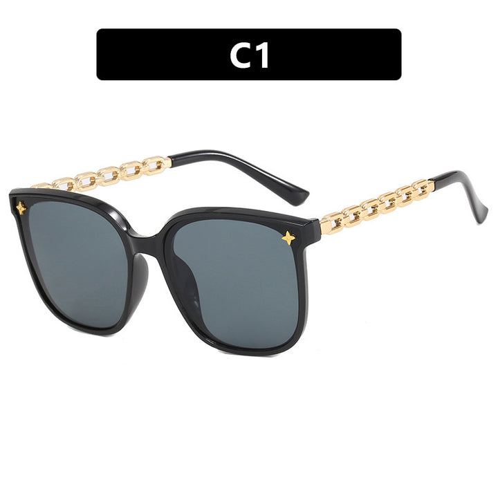 Dame moteriktig solbrille med stilige kjedeakenter Skanto