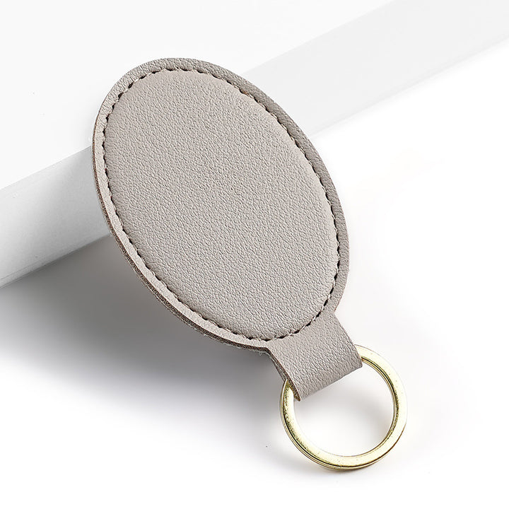 Unisex nøkkelring i høy kvalitet av kunstskinn med stiløs design Skanto