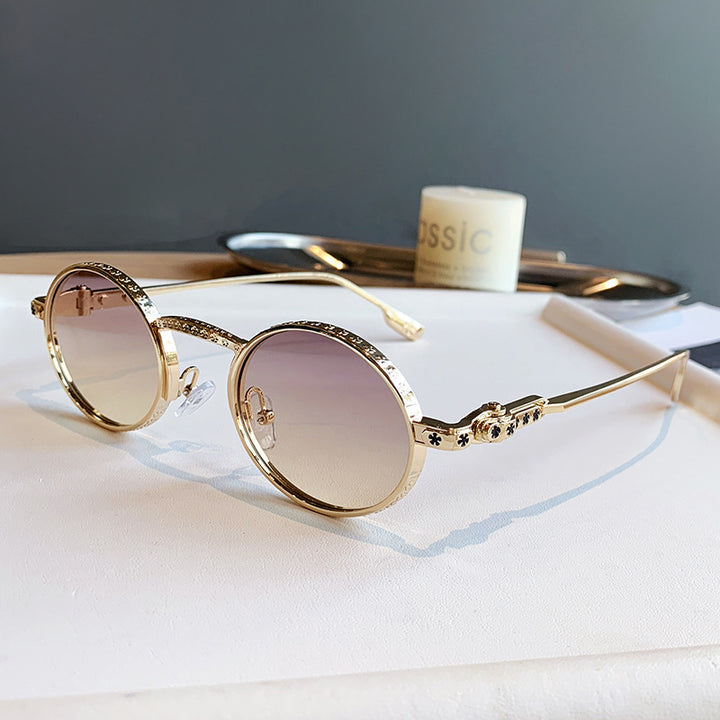 Dame Elegant solbrille med filigran detaljer Skanto