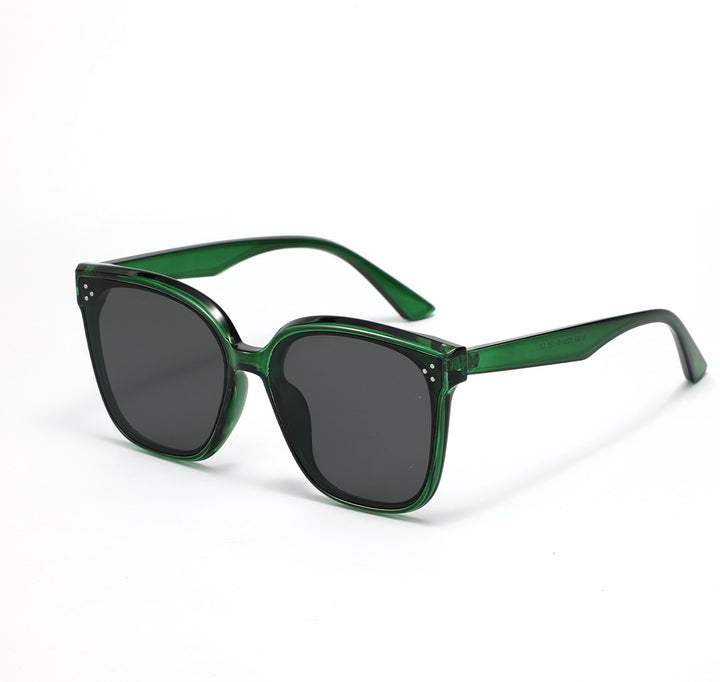Dame moteriktig solbrille med gjennomsiktig aksent Skanto