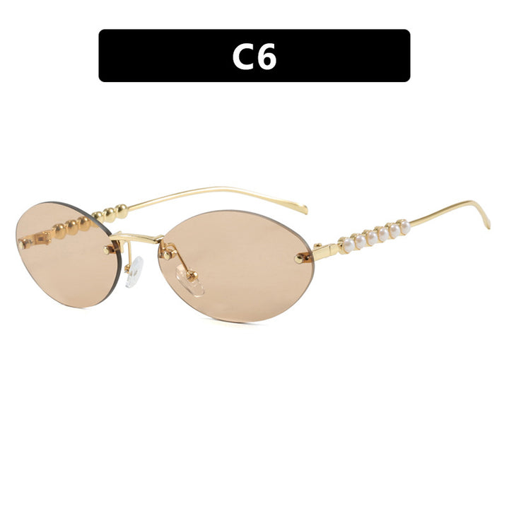 Women's stylish oval sunglasses with elegant decorations Skanto