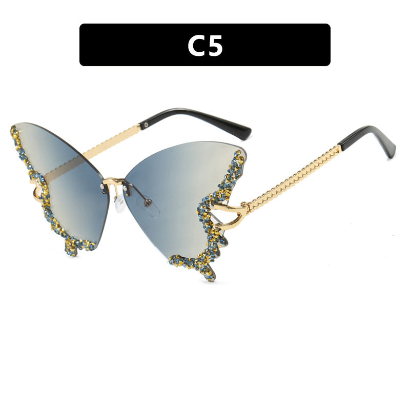 Women's large cat-eye sunglasses with sparkling rhinestone decoration and elegant frame Skanto