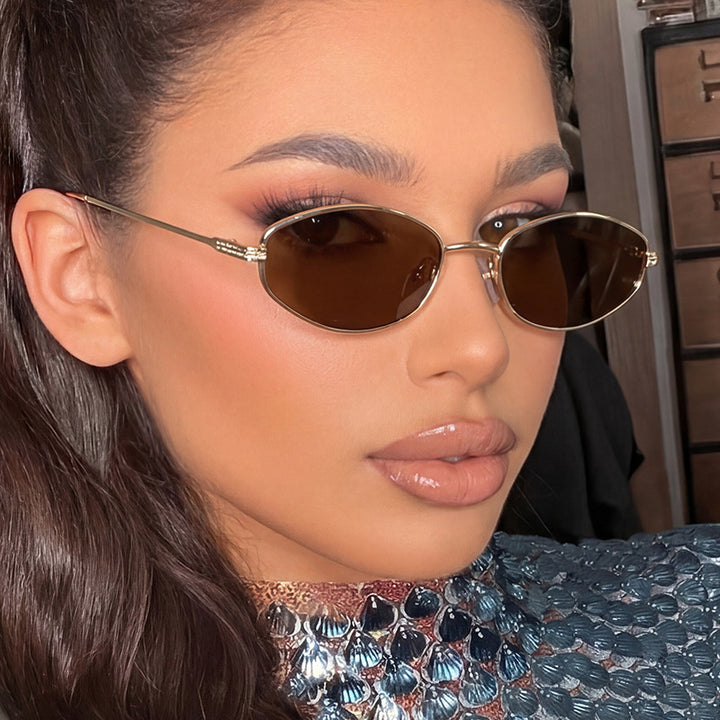 Women's fashionable sunglasses in a minimalist oval design Skanto