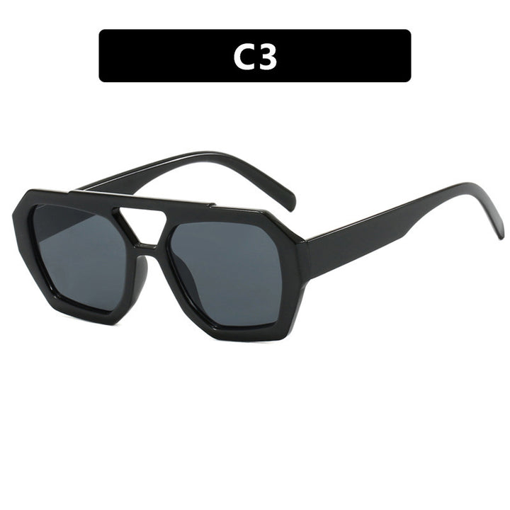 Dame oversized solbrille i markant, åttkantet design Skanto