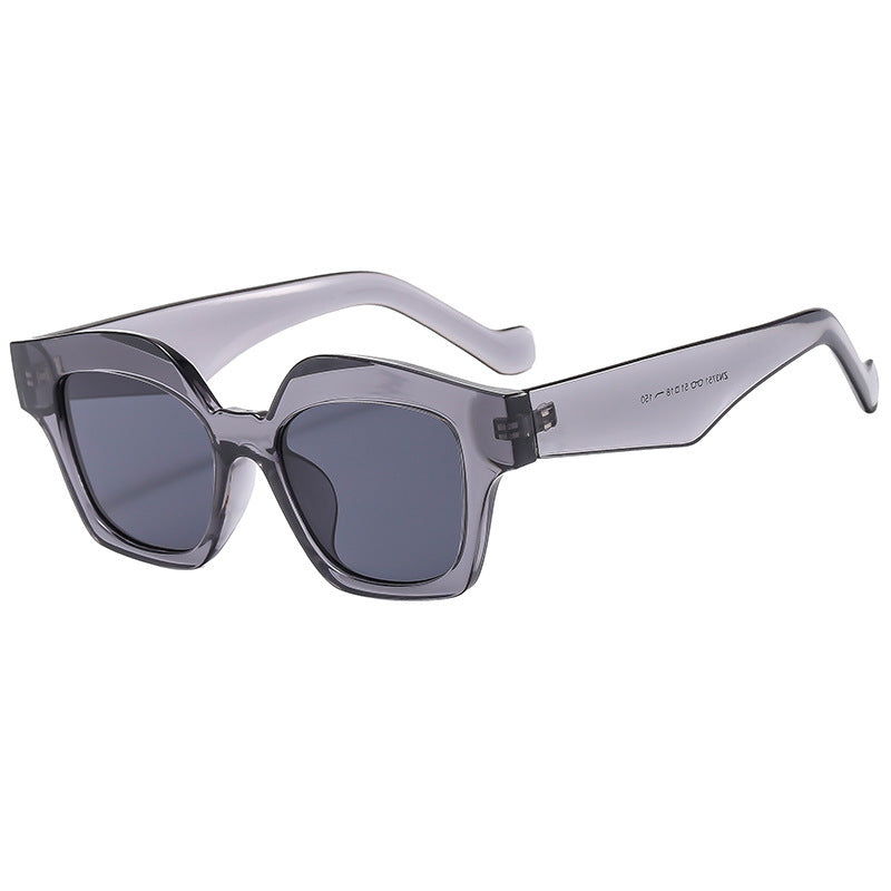 Dame designer solbrille i moderne skilpadde stil Skanto