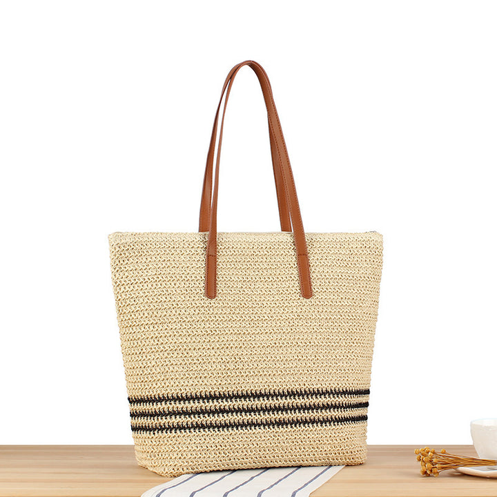 Stylish beach bag made of natural weave with leather handles Skanto