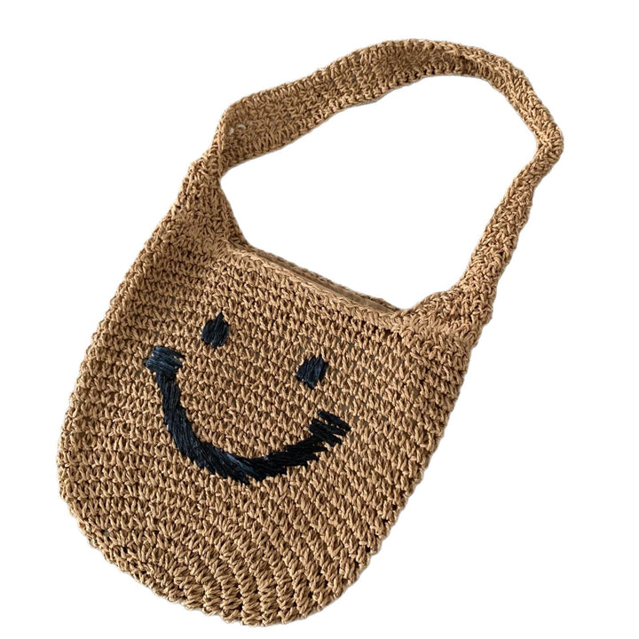 Håndveske med smilende motiv Skanto