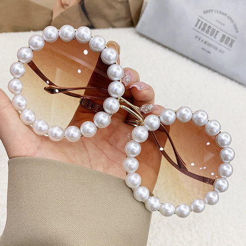 Damer elegant oversized solbriller med stilfull transparent ramme Skanto