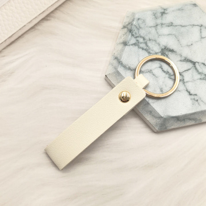 Unisex nøkkelring i høy kvalitet av kunstskinn med stiløs design Skanto