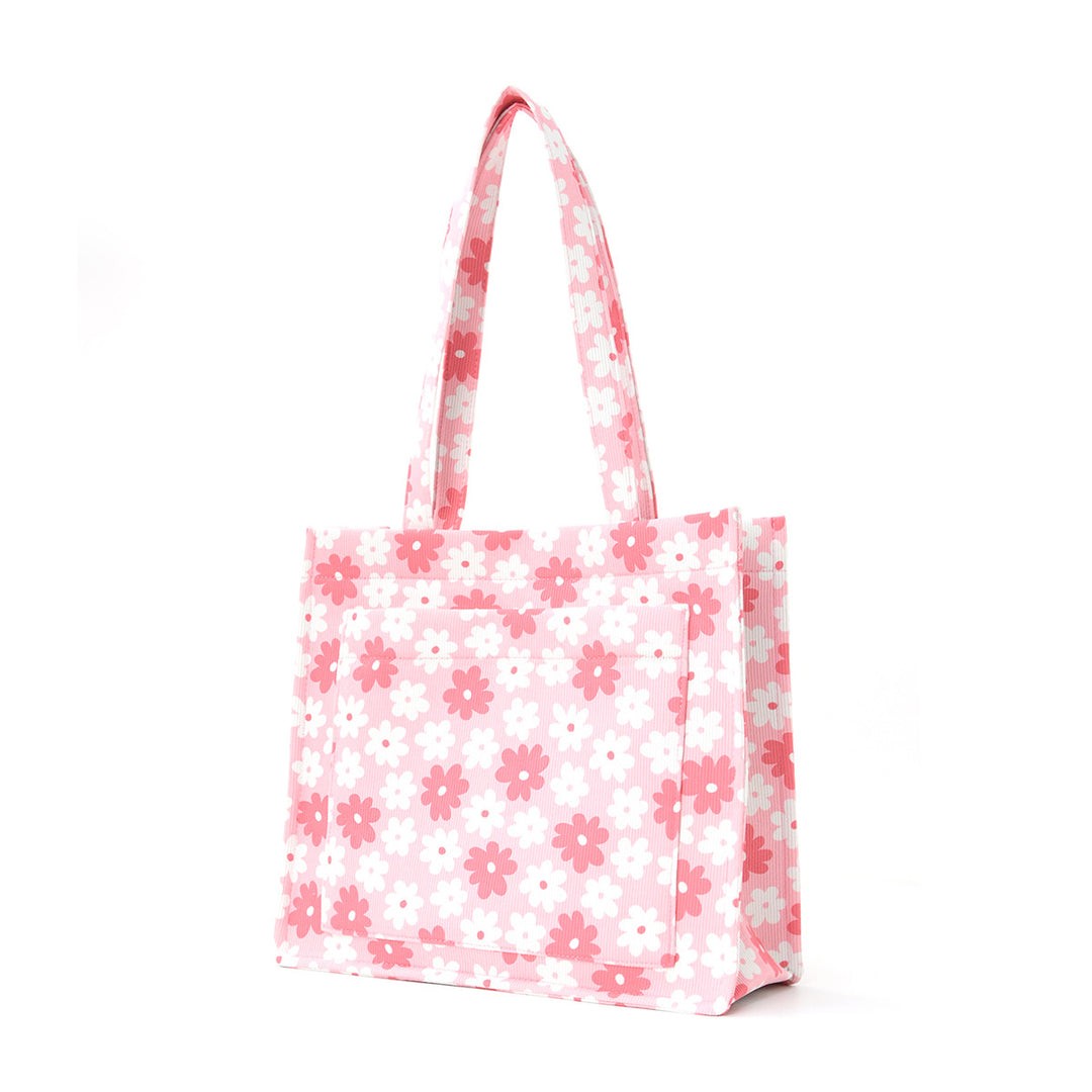 Trendete handlepose med blomsterdesign Skanto