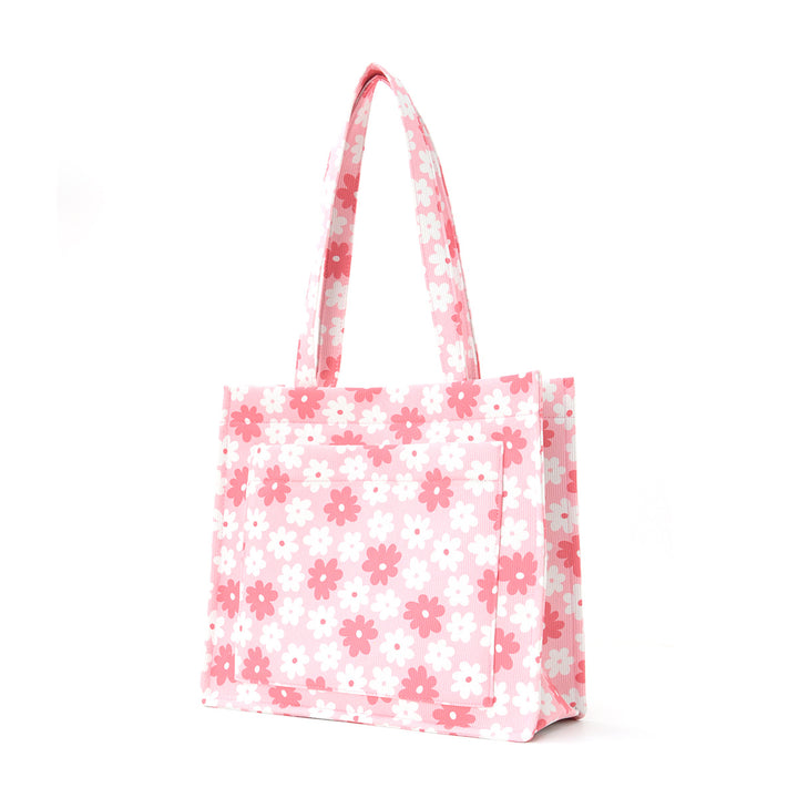 Trendete handlepose med blomsterdesign Skanto