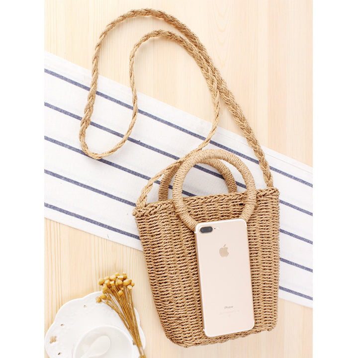 Woven natural material handbag with round handle Skanto