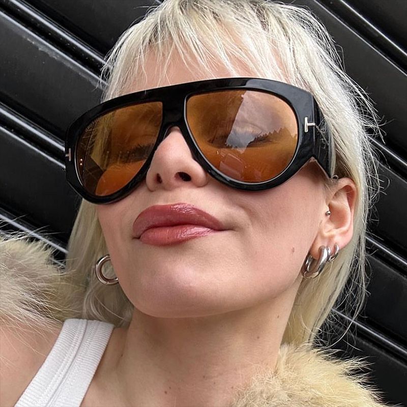 Dame elegant solbrille i markant design Skanto