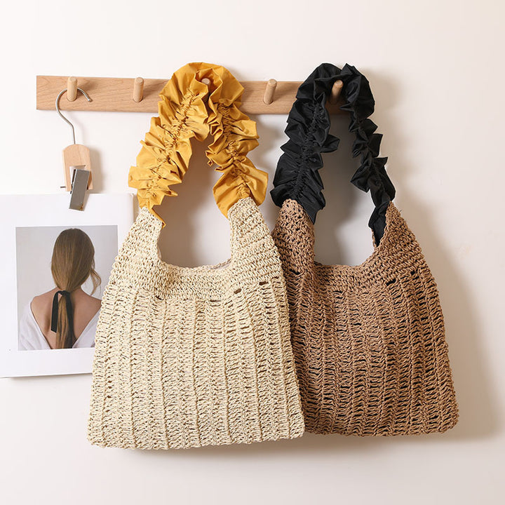 Elegant handbag with ruched decorative handle Skanto