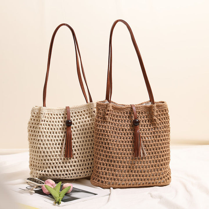Hand-knotted basket bag with elegant leather handle Skanto