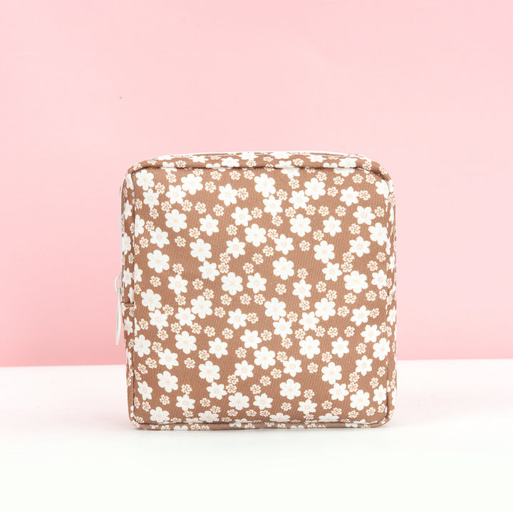 Kosmetikk-organisator med blomsterinspirert design Skanto