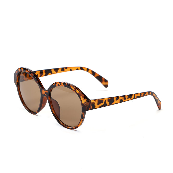 Dame rund moteriktig solbrille med iøynefallende leopardmønster Skanto