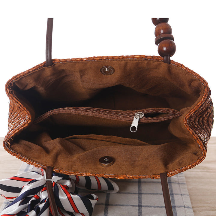 Elegant basket bag with stylish ribbon detail Skanto