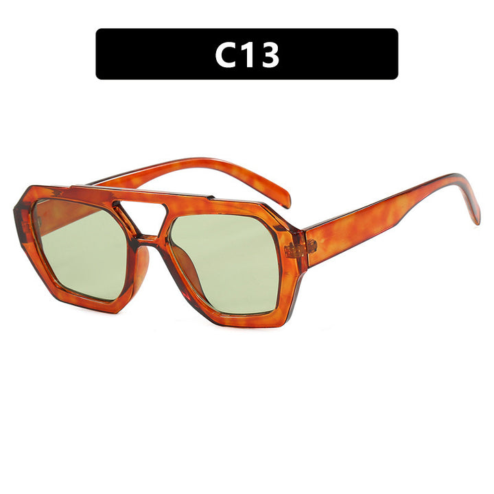 Dame oversized solbrille i markant, åttkantet design Skanto
