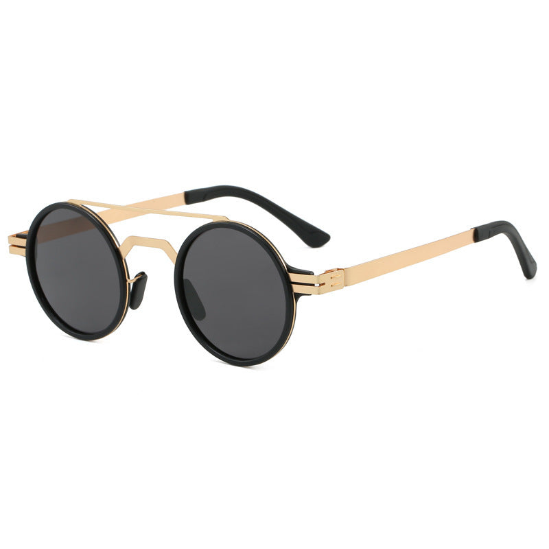Dame moterunde solbriller med minimalistisk design Skanto