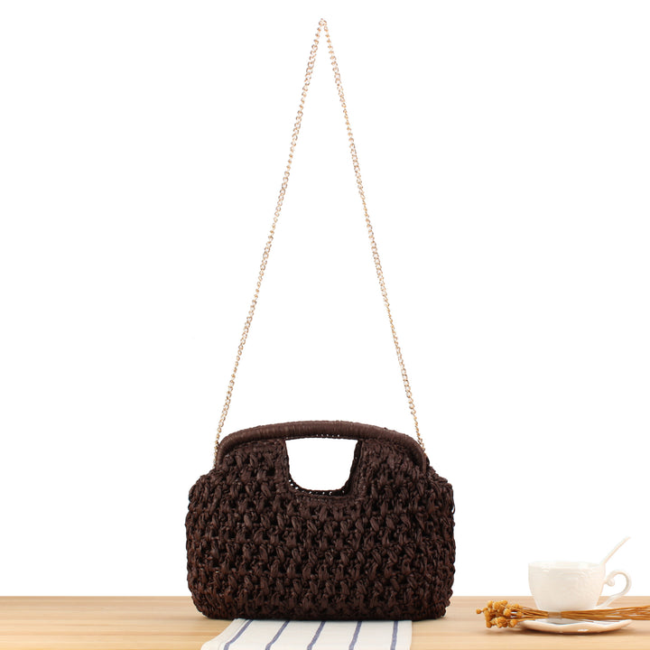 Handbag made of naturally coated braided material with elegant chain detail Skanto