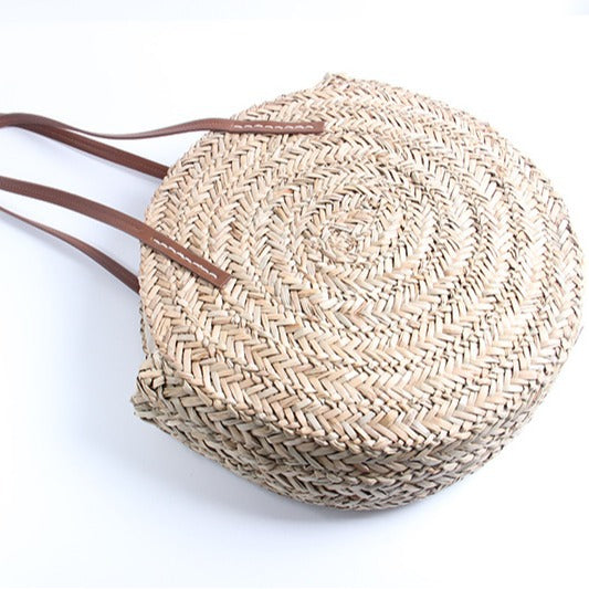 Braided straw beach bag with elegant leather handles Skanto