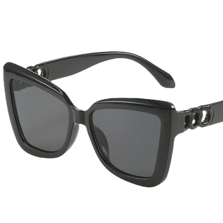 Dame moderne Cat-Eye solbriller med klar ramme og UV-beskyttelse Skanto
