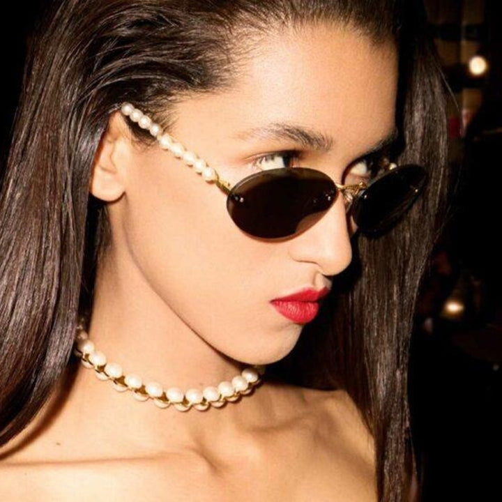 Women's stylish oval sunglasses with elegant decorations Skanto