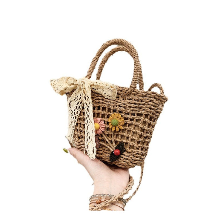 Lekker kurvveske med blomsterapplikasjoner Skanto