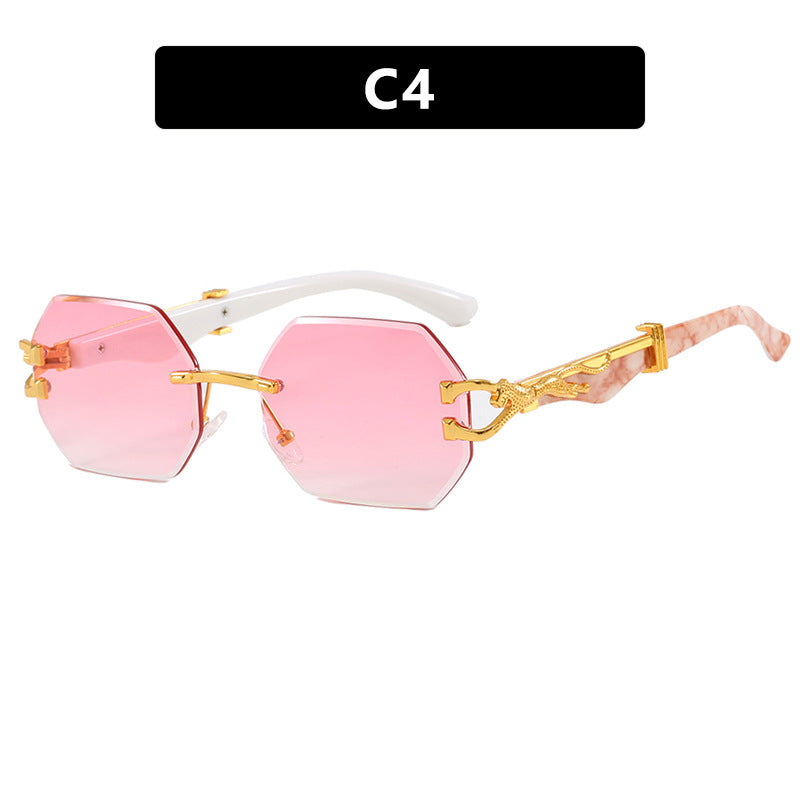 Women's fashionable sunglasses with extravagant octagonal design and gold accents Skanto