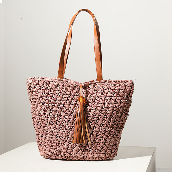 Handmade basket bag with stylish fringe details Skanto