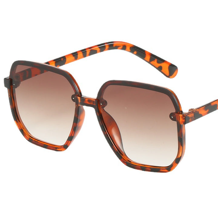 Dame geometrisk solbrille i moderne design Skanto