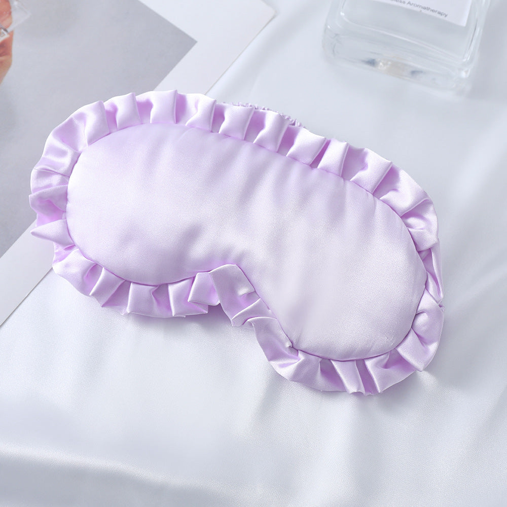 Dame nan satin-glinsende øyemaske med ergonomisk kontur, volangkant og myk polstring Skanto