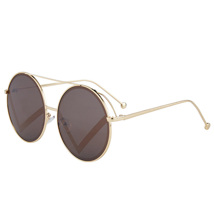 Kvinnelige fashionable runde solbriller Skanto