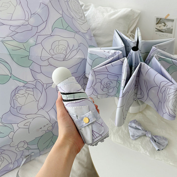 Dame sammenleggbart paraply med blomsterminalisme Skanto