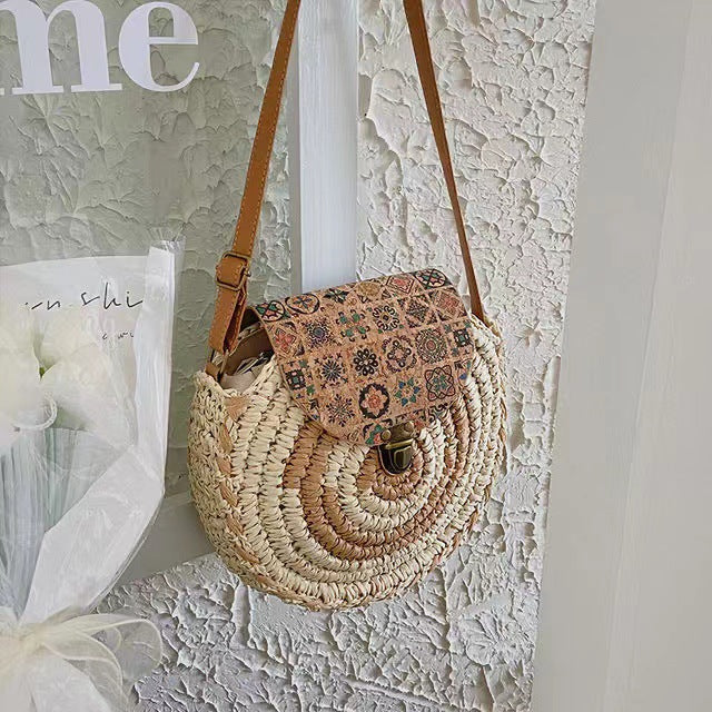 Round straw bag with adjustable leather strap Skanto