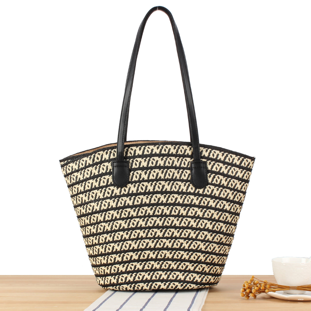 Designer handbag with contrasting pattern and elegant leather handles Skanto